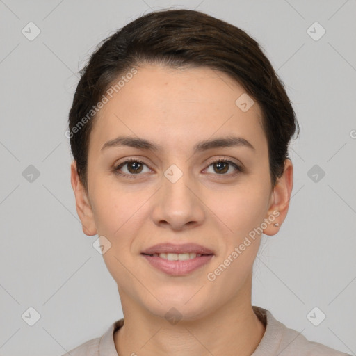 Joyful white young-adult female with short  brown hair and brown eyes