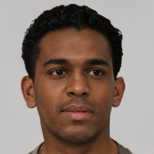 Neutral black young-adult male with short  brown hair and brown eyes