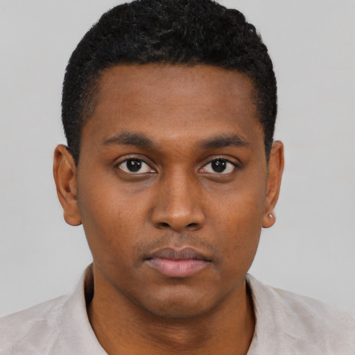 Neutral black young-adult male with short  brown hair and brown eyes