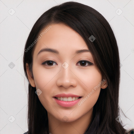 Joyful white young-adult female with long  black hair and brown eyes