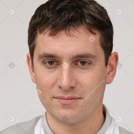 Joyful white young-adult male with short  brown hair and brown eyes