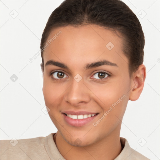 Joyful white young-adult female with short  brown hair and brown eyes