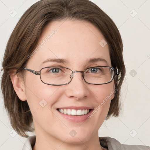 Joyful white young-adult female with medium  brown hair and green eyes