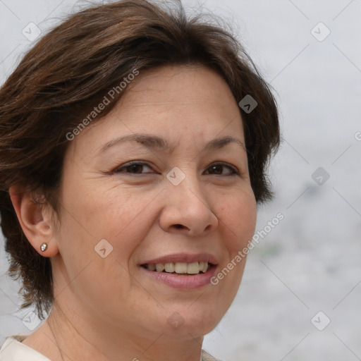 Joyful white adult female with short  brown hair and brown eyes