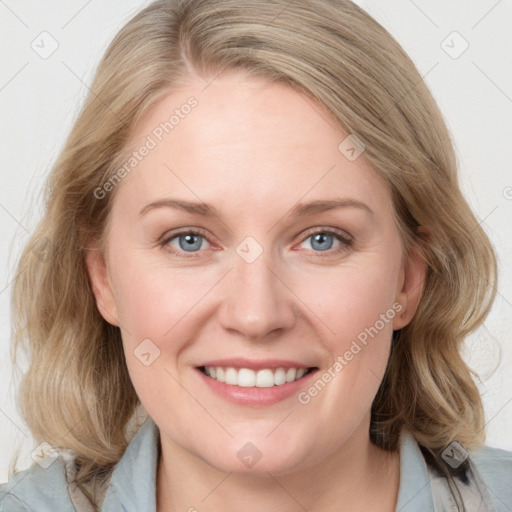 Joyful white young-adult female with medium  brown hair and blue eyes