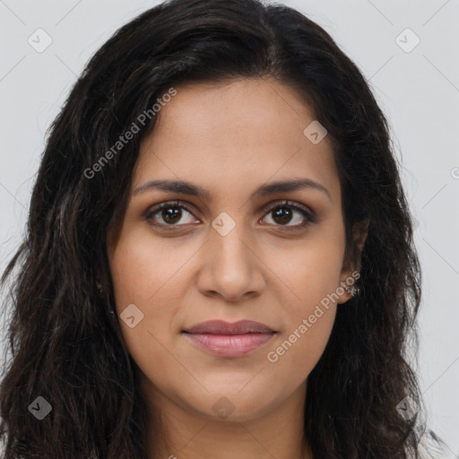 Joyful latino young-adult female with long  brown hair and brown eyes