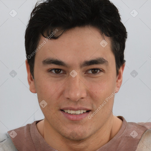 Joyful asian young-adult male with short  brown hair and brown eyes