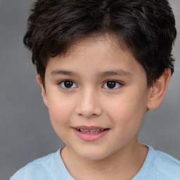 Joyful white child male with short  brown hair and brown eyes