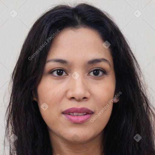 Joyful latino young-adult female with long  brown hair and brown eyes