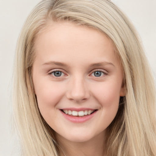 Joyful white young-adult female with long  brown hair and blue eyes