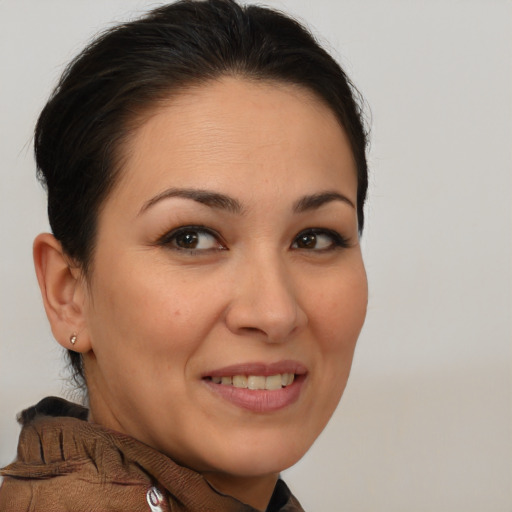 Joyful white young-adult female with medium  brown hair and brown eyes