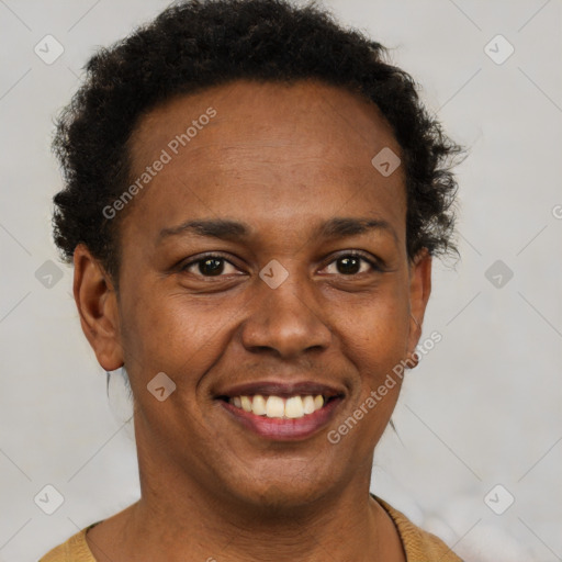 Joyful black adult female with short  brown hair and brown eyes