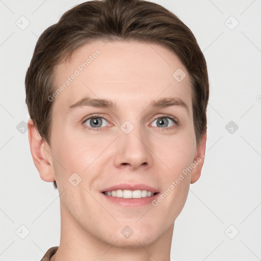 Joyful white young-adult female with short  brown hair and grey eyes