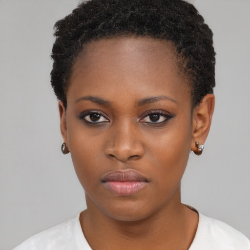 Neutral black young-adult female with short  black hair and brown eyes