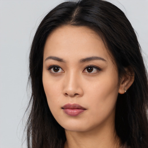 Neutral asian young-adult female with long  brown hair and brown eyes