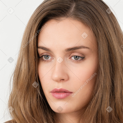 Neutral white young-adult female with long  brown hair and brown eyes