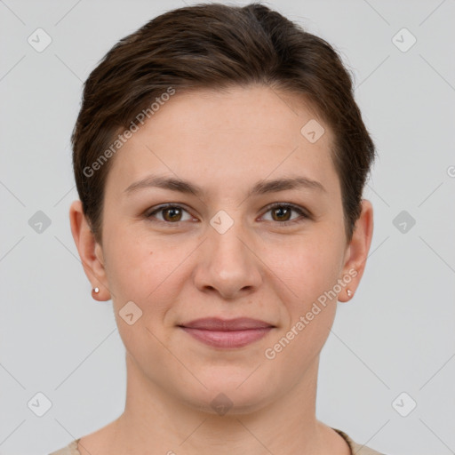 Joyful white young-adult female with short  brown hair and brown eyes