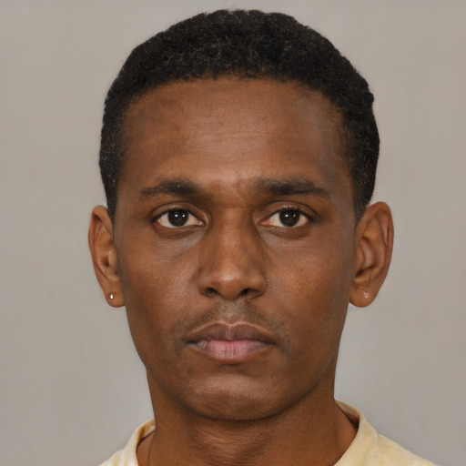 Neutral black young-adult male with short  black hair and brown eyes