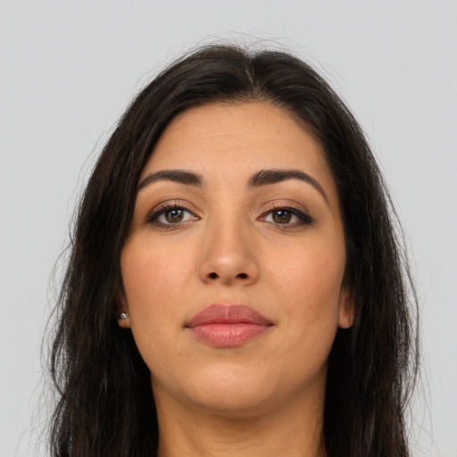 Neutral latino young-adult female with long  brown hair and brown eyes