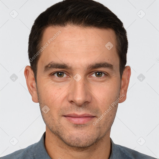 Joyful white young-adult male with short  brown hair and brown eyes