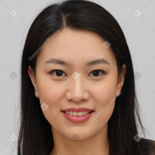 Joyful asian young-adult female with long  brown hair and brown eyes