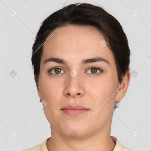 Neutral white young-adult female with short  brown hair and brown eyes