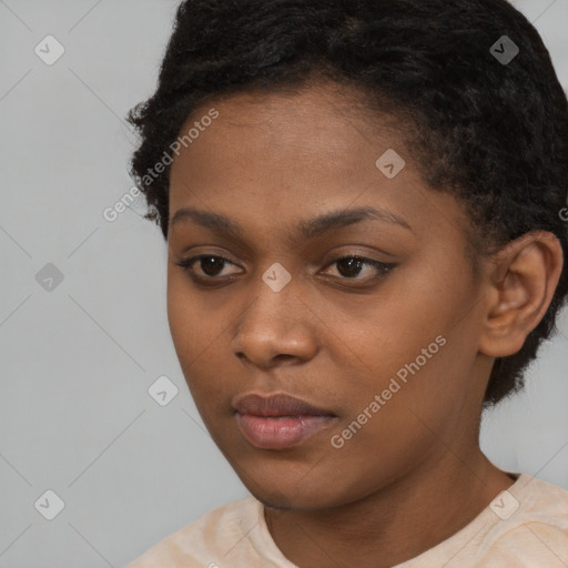 Neutral black young-adult female with short  brown hair and brown eyes