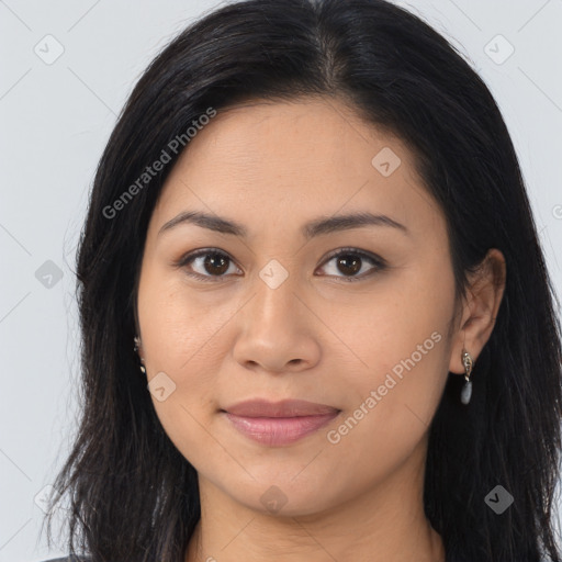 Joyful latino young-adult female with long  brown hair and brown eyes