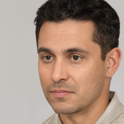Neutral white young-adult male with short  black hair and brown eyes