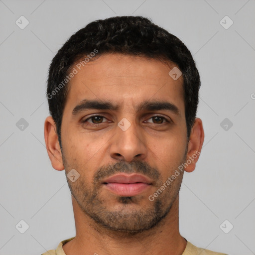 Neutral latino young-adult male with short  black hair and brown eyes