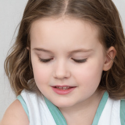 Joyful white child female with long  brown hair and brown eyes