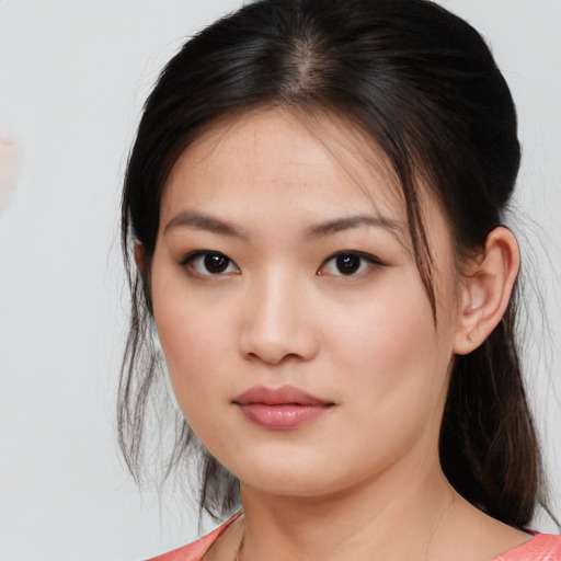 Neutral asian young-adult female with medium  brown hair and brown eyes