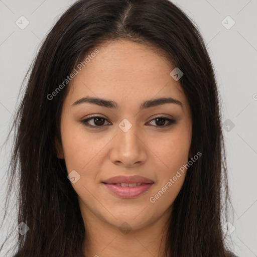 Joyful latino young-adult female with long  brown hair and brown eyes