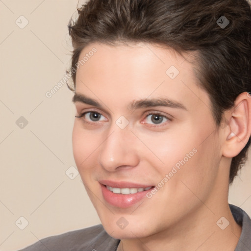 Joyful white young-adult male with medium  brown hair and brown eyes