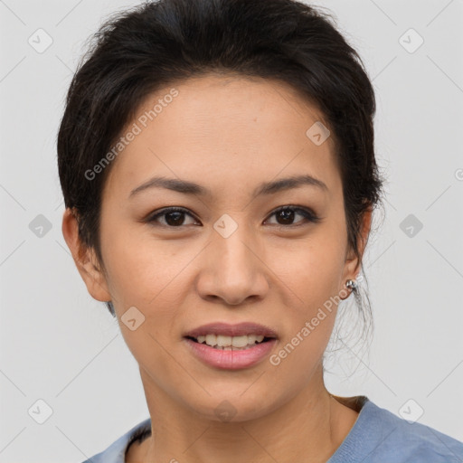 Joyful asian young-adult female with short  brown hair and brown eyes