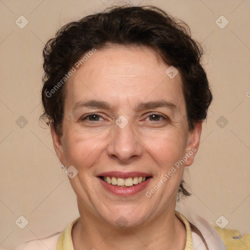 Joyful white adult female with short  brown hair and brown eyes