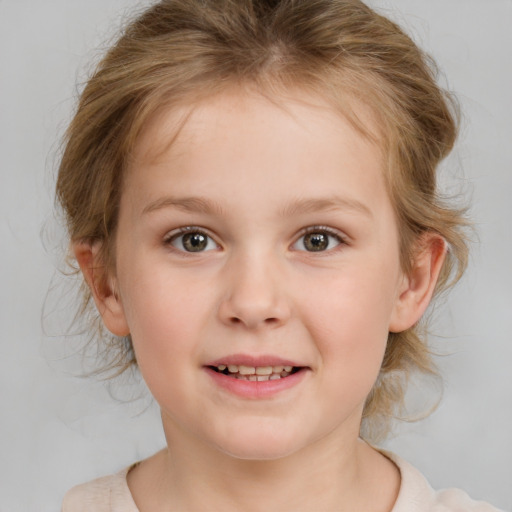 Joyful white child female with medium  brown hair and brown eyes