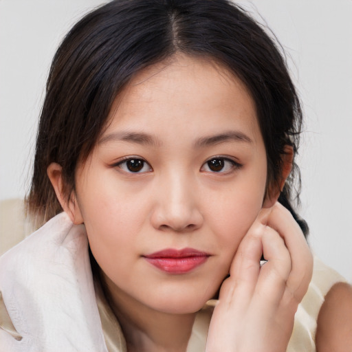 Neutral white young-adult female with medium  brown hair and brown eyes