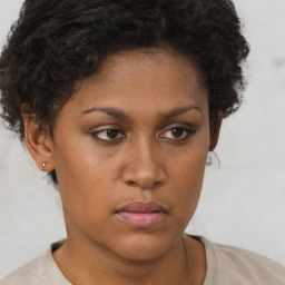 Neutral black young-adult female with short  brown hair and brown eyes