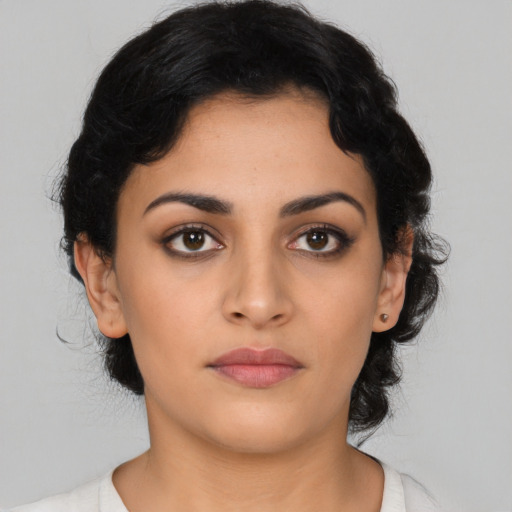 Neutral latino young-adult female with medium  black hair and brown eyes