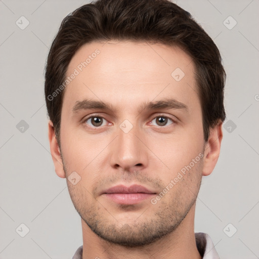 Neutral white young-adult male with short  brown hair and brown eyes