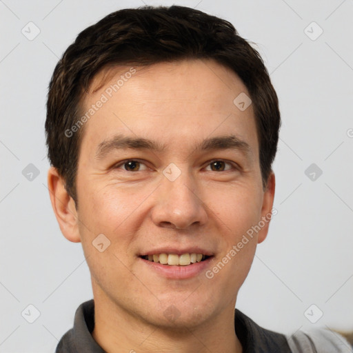 Joyful white young-adult male with short  brown hair and brown eyes