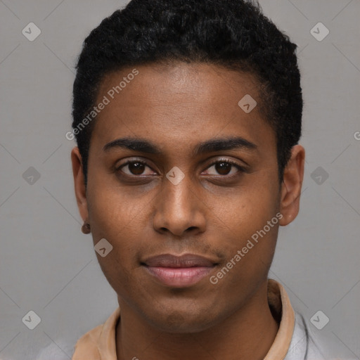 Joyful black young-adult male with short  black hair and brown eyes