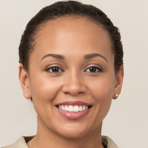 Joyful white young-adult female with short  brown hair and brown eyes