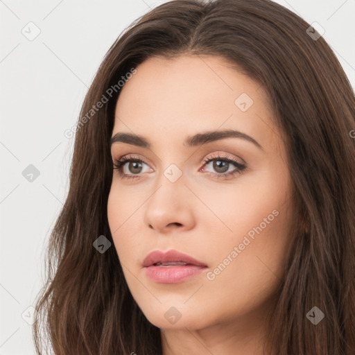 Neutral white young-adult female with long  brown hair and brown eyes