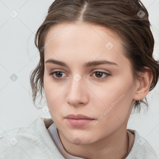 Neutral white young-adult female with medium  brown hair and brown eyes