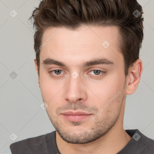 Neutral white young-adult male with short  brown hair and brown eyes