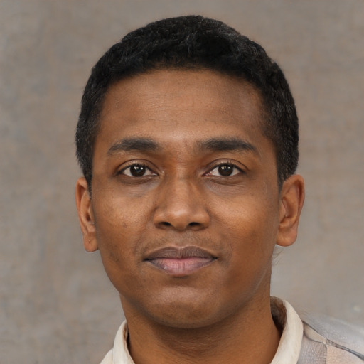 Neutral black young-adult male with short  black hair and brown eyes