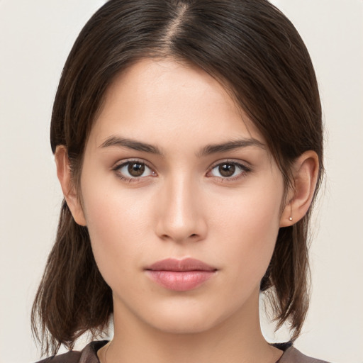 Neutral white young-adult female with medium  brown hair and brown eyes