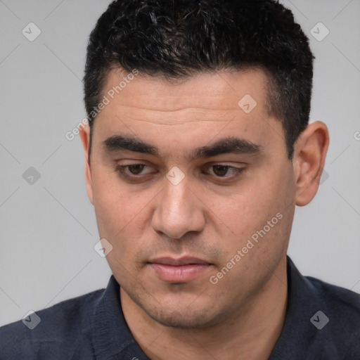 Neutral white young-adult male with short  black hair and brown eyes